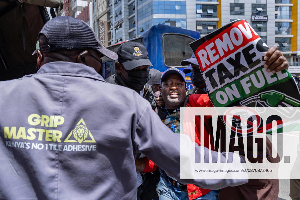 A Kenyan human rights activist is arrested during a protest. Protesters demonstrated against rising fuel prices and the cost of living in Nairobi s Central Business District, calling for lower fuel prices and the removal of fuel taxes. Nairobi Kenya - ZUMAs197 20261026_aaa_s197_323