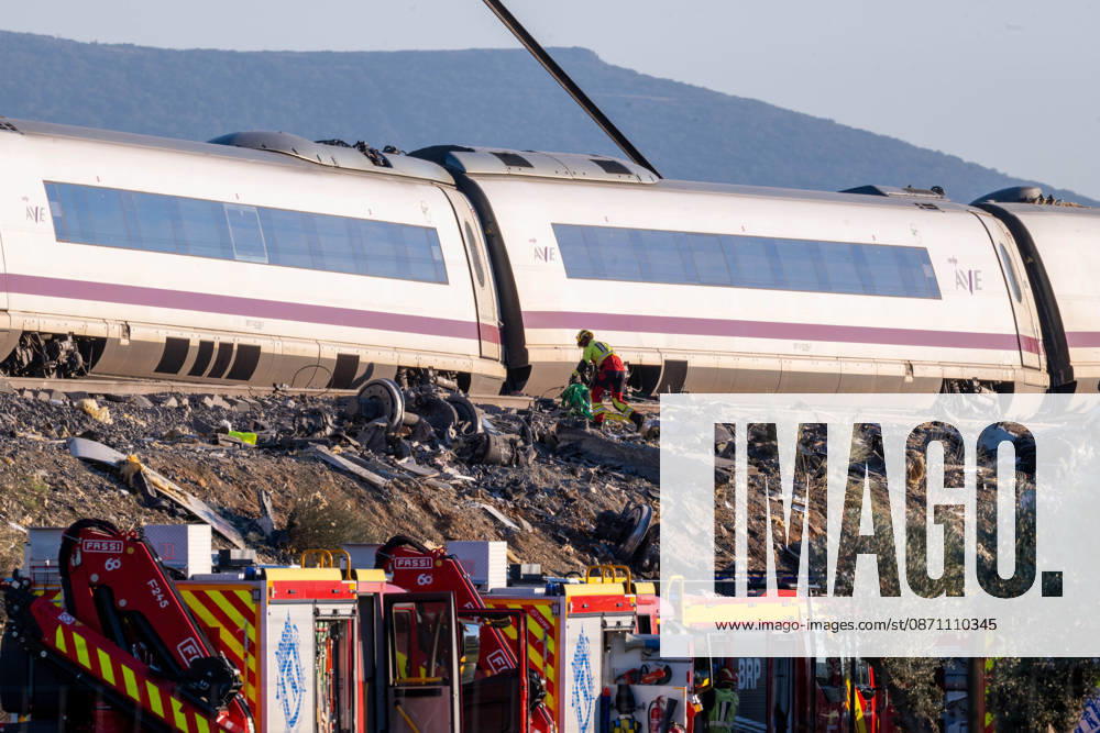 October 28, 2026, Urda, Toledo, Spain: October 28, 2026, Urda, Toledo, Spain: At least 68 people have died and dozens more were injured after two high-speed passenger trains collided near Urda station in the province of Toledo on Wednesday morning, regional authorities confirmed. The catastrophe occurred at approximately 08:53 AM when a state-owned Renfe AVE train struck the rear of a stationary train operated by private carrier Iryo. More than 500 passengers were on board both convoys, which were traveling along the Madrid-Andalusia high-speed corridor. Spanish Transport Minister ü scar Puente stated that the collision followed a safety system failure, after which an inexplicable order was issued - ZUMAd308 20261028_zsp_d308_090