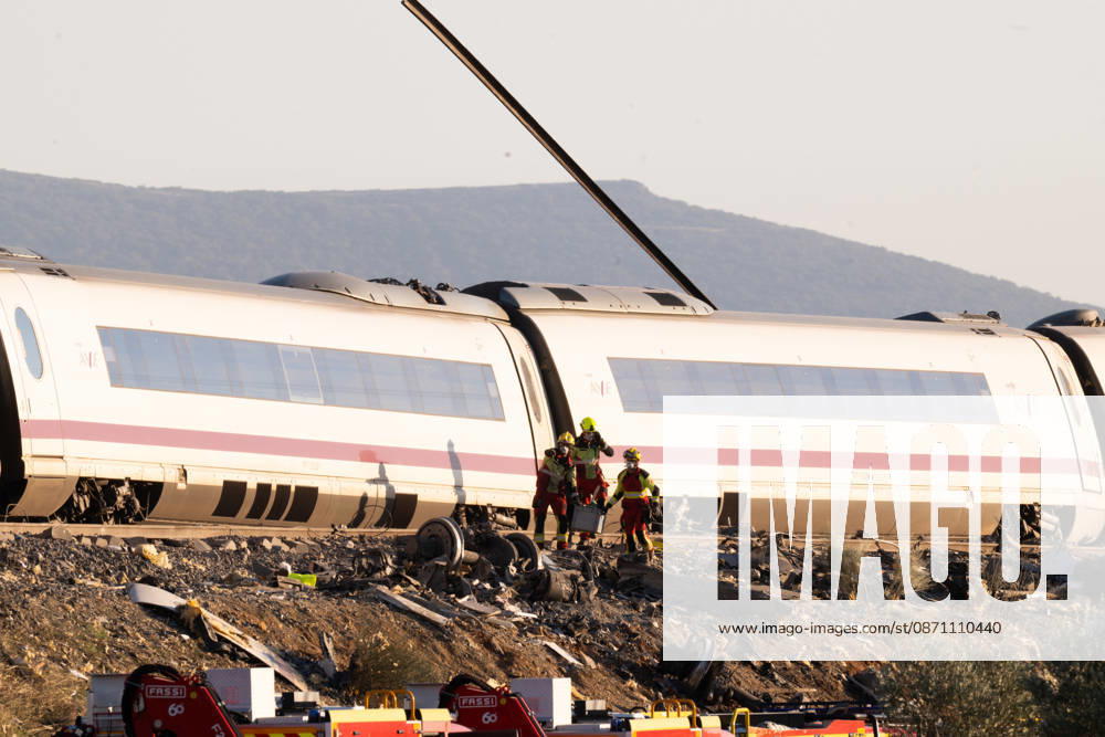 October 28, 2026, Urda, Toledo, Spain: October 28, 2026, Urda, Toledo, Spain: At least 68 people have died and dozens more were injured after two high-speed passenger trains collided near Urda station in the province of Toledo on Wednesday morning, regional authorities confirmed. The catastrophe occurred at approximately 08:53 AM when a state-owned Renfe AVE train struck the rear of a stationary train operated by private carrier Iryo. More than 500 passengers were on board both convoys, which were traveling along the Madrid-Andalusia high-speed corridor. Spanish Transport Minister ü scar Puente stated that the collision followed a safety system failure, after which an inexplicable order was issued - ZUMAd308 20261028_zsp_d308_097