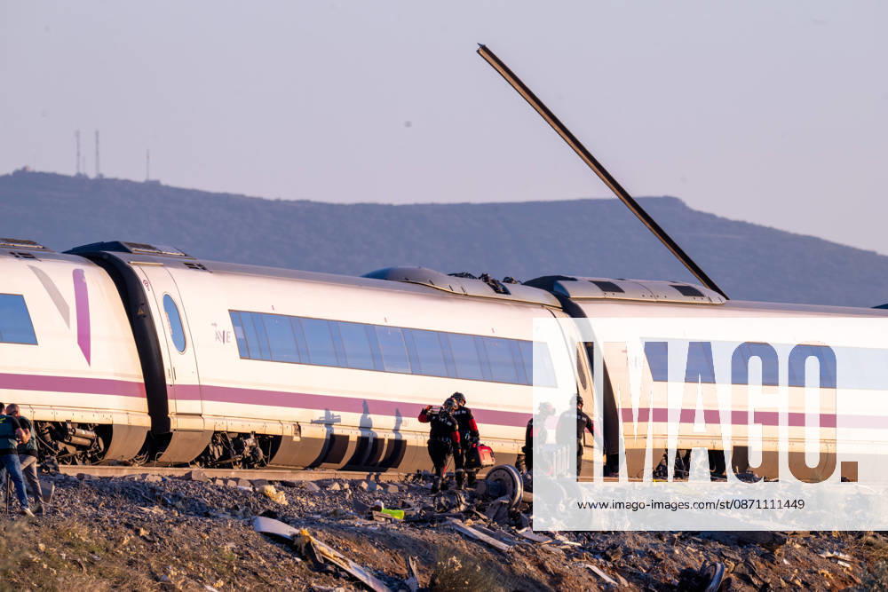 October 28, 2026, Urda, Toledo, Spain: October 28, 2026, Urda, Toledo, Spain: At least 68 people have died and dozens more were injured after two high-speed passenger trains collided near Urda station in the province of Toledo on Wednesday morning, regional authorities confirmed. The catastrophe occurred at approximately 08:53 AM when a state-owned Renfe AVE train struck the rear of a stationary train operated by private carrier Iryo. More than 500 passengers were on board both convoys, which were traveling along the Madrid-Andalusia high-speed corridor. Spanish Transport Minister ü scar Puente stated that the collision followed a safety system failure, after which an inexplicable order was issued - ZUMAd308 20261028_zsp_d308_113