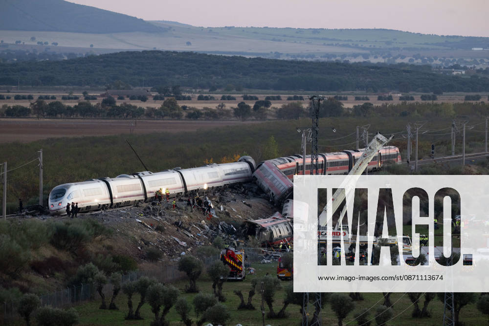 October 28, 2026, Urda, Toledo, Spain: October 28, 2026, Urda, Toledo, Spain: At least 68 people have died and dozens more were injured after two high-speed passenger trains collided near Urda station in the province of Toledo on Wednesday morning, regional authorities confirmed. The catastrophe occurred at approximately 08:53 AM when a state-owned Renfe AVE train struck the rear of a stationary train operated by private carrier Iryo. More than 500 passengers were on board both convoys, which were traveling along the Madrid-Andalusia high-speed corridor. Spanish Transport Minister ü scar Puente stated that the collision followed a safety system failure, after which an inexplicable order was issued - ZUMAd308 20261028_zsp_d308_148