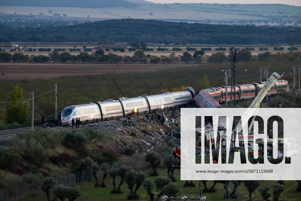 October 28, 2026, Urda, Toledo, Spain: October 28, 2026, Urda, Toledo, Spain: At least 68 people have died and dozens more were injured after two high-speed passenger trains collided near Urda station in the province of Toledo on Wednesday morning, regional authorities confirmed. The catastrophe occurred at approximately 08:53 AM when a state-owned Renfe AVE train struck the rear of a stationary train operated by private carrier Iryo. More than 500 passengers were on board both convoys, which were traveling along the Madrid-Andalusia high-speed corridor. Spanish Transport Minister ü scar Puente stated that the collision followed a safety system failure, after which an inexplicable order was issued - ZUMAd308 20261028_zsp_d308_149