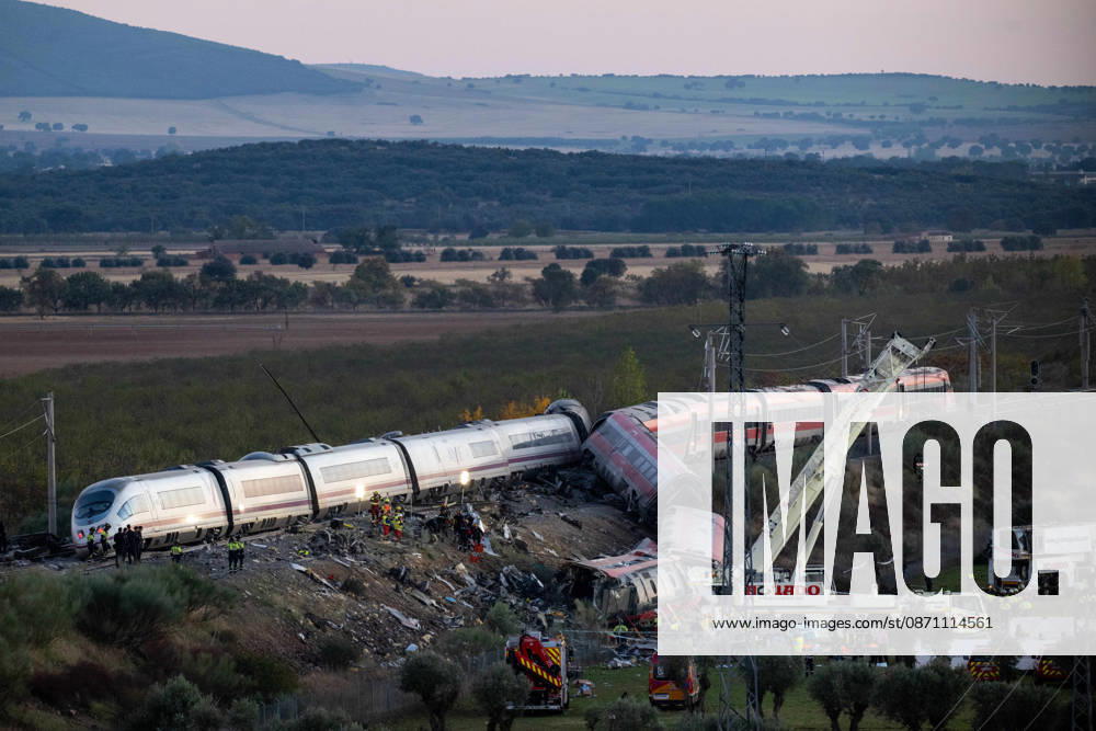 October 28, 2026, Urda, Toledo, Spain: October 28, 2026, Urda, Toledo, Spain: At least 68 people have died and dozens more were injured after two high-speed passenger trains collided near Urda station in the province of Toledo on Wednesday morning, regional authorities confirmed. The catastrophe occurred at approximately 08:53 AM when a state-owned Renfe AVE train struck the rear of a stationary train operated by private carrier Iryo. More than 500 passengers were on board both convoys, which were traveling along the Madrid-Andalusia high-speed corridor. Spanish Transport Minister ü scar Puente stated that the collision followed a safety system failure, after which an inexplicable order was issued - ZUMAd308 20261028_zsp_d308_155