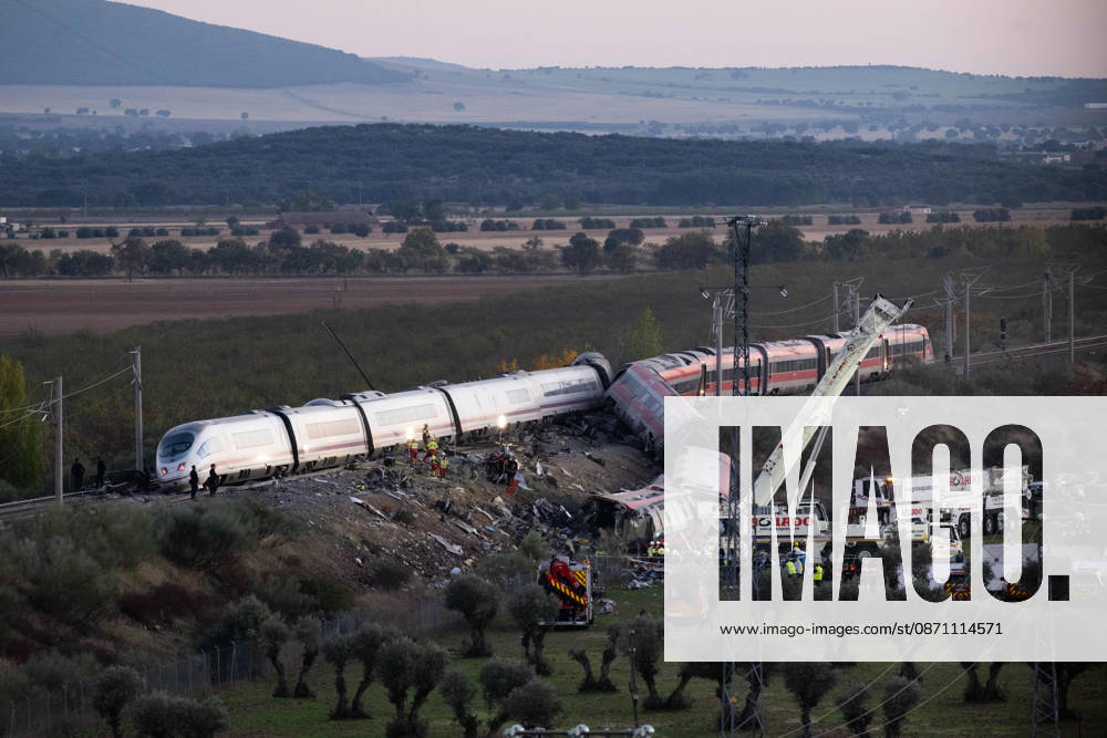 October 28, 2026, Urda, Toledo, Spain: October 28, 2026, Urda, Toledo, Spain: At least 68 people have died and dozens more were injured after two high-speed passenger trains collided near Urda station in the province of Toledo on Wednesday morning, regional authorities confirmed. The catastrophe occurred at approximately 08:53 AM when a state-owned Renfe AVE train struck the rear of a stationary train operated by private carrier Iryo. More than 500 passengers were on board both convoys, which were traveling along the Madrid-Andalusia high-speed corridor. Spanish Transport Minister ü scar Puente stated that the collision followed a safety system failure, after which an inexplicable order was issued - ZUMAd308 20261028_zsp_d308_156