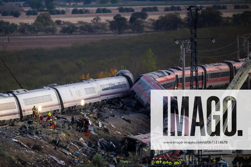 October 28, 2026, Urda, Toledo, Spain: October 28, 2026, Urda, Toledo, Spain: At least 68 people have died and dozens more were injured after two high-speed passenger trains collided near Urda station in the province of Toledo on Wednesday morning, regional authorities confirmed. The catastrophe occurred at approximately 08:53 AM when a state-owned Renfe AVE train struck the rear of a stationary train operated by private carrier Iryo. More than 500 passengers were on board both convoys, which were traveling along the Madrid-Andalusia high-speed corridor. Spanish Transport Minister ü scar Puente stated that the collision followed a safety system failure, after which an inexplicable order was issued - ZUMAd308 20261028_zsp_d308_157