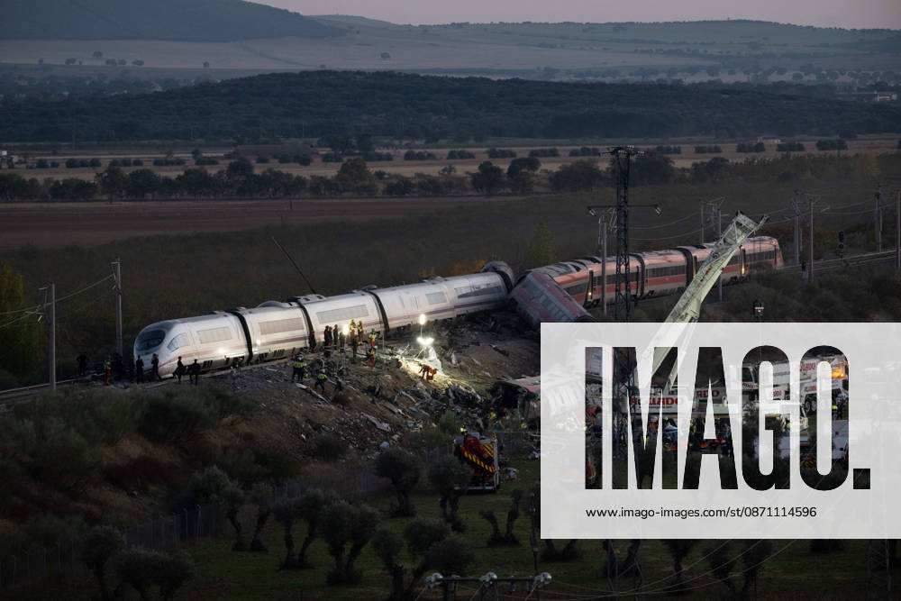 October 28, 2026, Urda, Toledo, Spain: October 28, 2026, Urda, Toledo, Spain: At least 68 people have died and dozens more were injured after two high-speed passenger trains collided near Urda station in the province of Toledo on Wednesday morning, regional authorities confirmed. The catastrophe occurred at approximately 08:53 AM when a state-owned Renfe AVE train struck the rear of a stationary train operated by private carrier Iryo. More than 500 passengers were on board both convoys, which were traveling along the Madrid-Andalusia high-speed corridor. Spanish Transport Minister ü scar Puente stated that the collision followed a safety system failure, after which an inexplicable order was issued - ZUMAd308 20261028_zsp_d308_160