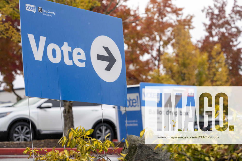 A King County Elections sign reading Vote points the direction to a ballot drop box in a parking lot in Renton, Washington, USA, on Thu., Oct. 29, 2026. Approximately 98% of votes cast in Washington state are mail-in ballots. Renton USA - ZUMAb344 20261029_znp_b344_047