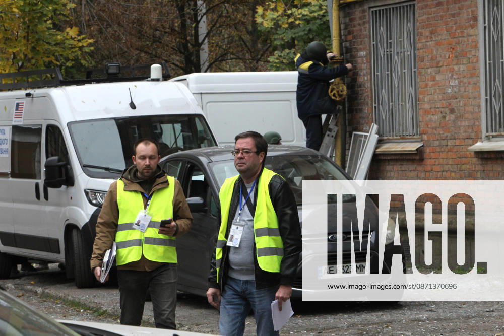 First responders work outside an apartment block on Oleksandra Polia Avenue damaged by a Russian drone strike in Dnipro, Ukraine, on October 30, 2026. The Russian attack damaged at least five residential high-rise buildings and a school. More than 300 windows were shattered in the strike. (Photo by Mykola Miakshykov Ukrinform) Russian attack damages residential buildings and school in Dnipro