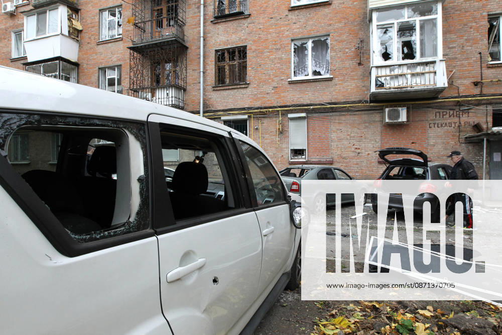 Cars are parked outside an apartment block on Oleksandra Polia Avenue damaged by a Russian drone strike in Dnipro, Ukraine, on October 30, 2026. The Russian attack damaged at least five residential high-rise buildings and a school. More than 300 windows were shattered in the strike. (Photo by Mykola Miakshykov Ukrinform) Russian attack damages residential buildings and school in Dnipro