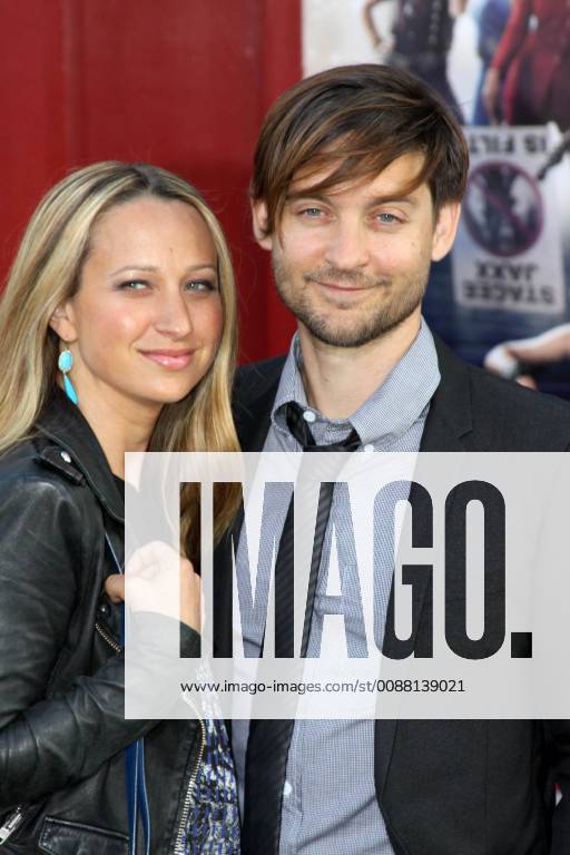 Tobey Maguire and wife Jennifer Meyer at the world premiere of New Line Cinema s Rock Of Ages . Arrivals held at the Grauman s Chinese Theater in Hollywood, CA
