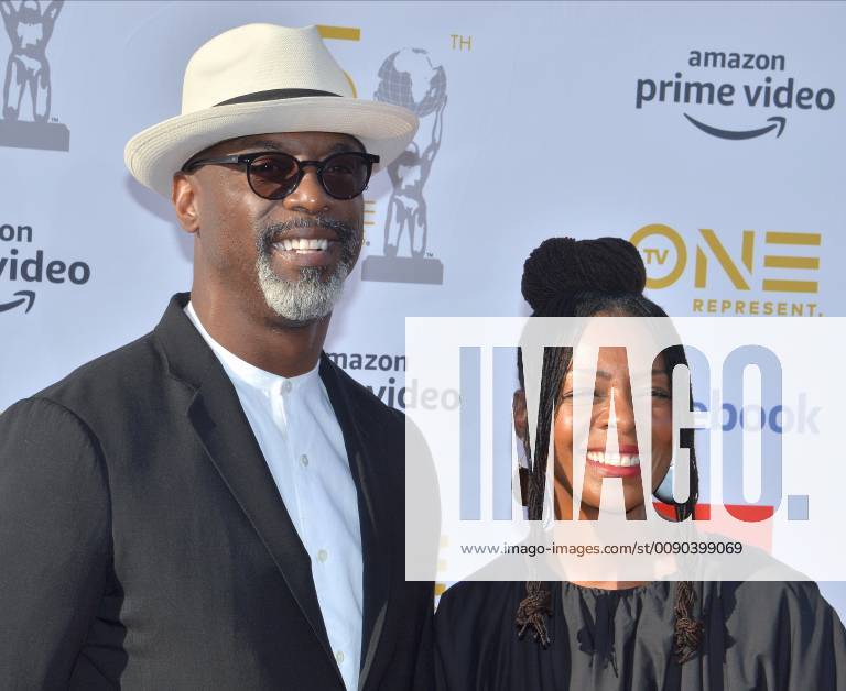 Isaiah Washington and Jenisa Garland arrive for the 50th annual NAACP Image Awards at the Dolby Theatre in the Hollywood section of Los Angeles on March 30, 2019. The NAACP Image Awards celebrates the accomplishments of people of color in the fields of television, music, literature and film and also honors individuals or groups who promote social justice through creative endeavors. LAP20190330513 JIMxRUYMEN
