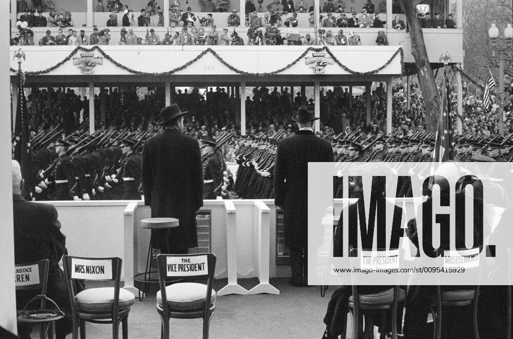 Rear View of U.S. President Dwight Eisenhower and U.S. Vice President Richard Nixon Reviewing Inauguration Parade, First Lady Mamie Eisenhower and Second Lady Pat Nixon seated right, Washington, D.C., USA, photographer Thomas J. O Halloran, Warren K. Leffler