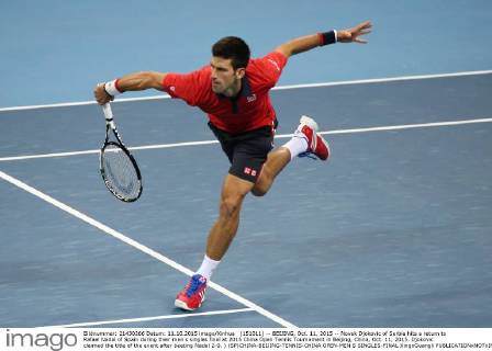 (151011) -- BEIJING, Oct. 11, 2015 -- Novak Djokovic of Serbia hits a return to Rafael Nadal of Spain during their men s singles final at 2015 China Open Tennis Tournament in Beijing, China, Oct. 11, 2015. Djokovic claimed the title of the event after beating Nadal 2-0. ) (SP)CHINA-BEIJING-TENNIS-CHINA OPEN-MEN S SINGLES-FINAL XingxGuangli