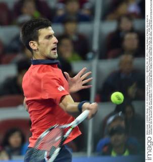 (151011) -- BEIJING, Oct. 11, 2015 -- Novak Djokovic of Serbia hits a return to Rafael Nadal of Spain during their men s singles final at 2015 China Open Tennis Tournament in Beijing, China, Oct. 11, 2015. Djokovic claimed the title of the event after beating Nadal 2-0. ) (SP)CHINA-BEIJING-TENNIS-CHINA OPEN-MEN S SINGLES-FINAL LixWen