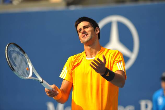 091009) -- BEIJING, Oct. 9, 2009 -- Novak Djokovic of Serbia reacts during the men s singles quarterfinal match against Fernando Verdasco of Spain at the China Open tennis tournament in Beijing, Oct. 9, 2009. Djokovic won the match 2-1... (Luo Xiaoguang) (txy (3)CHINA-BEIJING-TENNIS-CHINA OPEN-DJOKOVIC VS VERDASCO (CN)  - ZUMAx10_