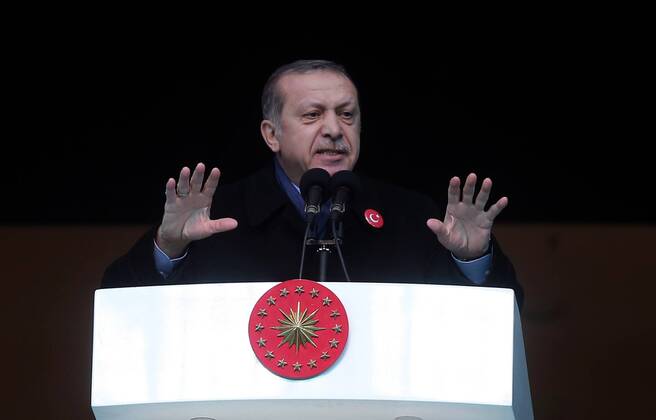 Turkish President Recep Tayyip Erdogan speaks before a friendly football match held for the martyrs killed on the recent terror attacks in Turkey, at Vodafone Arena in Istanbul, Turkey on December 22, 2016. Foreign and Turkish footballers from Turkish Spor Toto Super League s 18 team, compete at the friendly match and the income of the match will be donated to relatives of the martyrs. Copyright: TolgaxAdanali 15587361