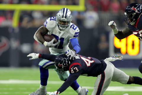 October 7, 2018 - Houston, Texas, U.S - Dallas Cowboys running back Ezekiel Elliott (21) is tackled low by Houston Texans cornerback Shareece Wright (43) on a running play during the first quarter of the NFL American Football Herren USA regular season game between the Houston Texans and the Dallas Cowboys at NRG Stadium in Houston, TX on October 7, 2018 NFL 2018 - Dallas Cowboys vs Houston Texans OCT 07 - ZUMAw137 20181007_zap_w137_036 Copyright: xErikxWilliamsx