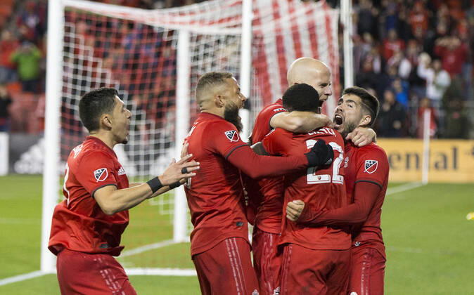 (191020) -- TORONTO, Oct. 20, 2019 -- Players of Toronto FC celebrate scoring during the first round match of the 2019 Major League Soccer MLS, Fussball Herren, USA Cup Playoffs between D.C. United and Toronto FC at BMO Field in Toronto, Canada, Oct. 19, 2019. (Photo by Xinhua) (SP)CANADA-TORONTO-SOCCER-MLS-PLAYOFFS-TORONTO FC VS D.C. UNITED ZouxZheng