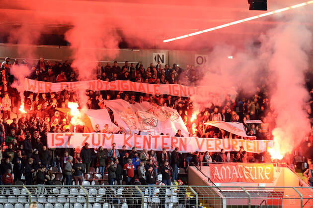 Fans of FC Bayern Munich II ignite Bengalos and smoke bombs, Bengalo, Bengalos, fireworks, flare, fans, audience, spectators, mood, atmosphere, stadium, 28 10 2019, Munich Germany , football, 3 League, FC Bayern Munich II SV Waldhof Mannheim, DFB DFL REGULATIONS PROHIBIT ANY USE OF PHOTOGRAPHS AS IMAGE SEQUENCES AND OR QUASI VIDEO xslx