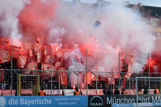 Fans of FC Bayern Munich II ignite Bengalos and smoke bombs, Bengalo, Bengalos, fireworks, flare fans, audience, spectators, mood, atmosphere, stadium, 24 11 2019, Munich Germany , football, 3 league, TSV 1860 Munich FC Bayern Munich II, DFB DFL REGULATIONS PROHIBIT ANY USE OF PHOTOGRAPHS AS IMAGE SEQUENCES AND OR QUASI VIDEO xslx