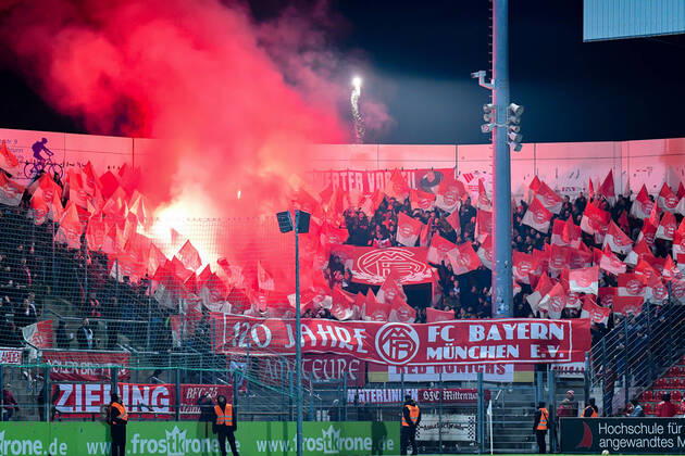 Fans of FC Bayern Munich II ignite Bengalos and shoot rockets, Bengalo, Bengalos, fireworks, flare, fans, audience, spectators, mood, atmosphere, stadium, 28 02 2020, Unterhaching Germany , Football, 3 League, SpVgg Unterhaching FC Bayern Munich II, DFB DFL REGULATIONS PROHIBIT ANY USE OF PHOTOGRAPHS AS IMAGE SEQUENCES AND OR QUASI VIDEO xslx