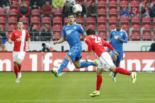 Mainz, Germany 05 October 2013 1 Bundesliga 13 14 8 Spieltag 1 FSV Mainz 05 vs 1899 Hoffenheim v li Kevin Volland Hoffenheim in header duel against Joo Ho Park Mainz , header header duel, landscape, landscape 1 Bundesliga 13 14 8 Spieltag 1 FSV Mainz 05 vs 1899 Hoffenheim jr