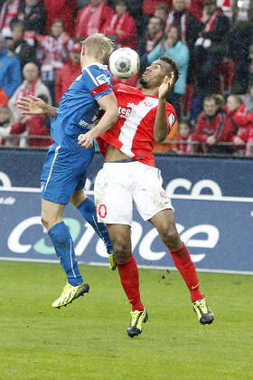 Mainz, Germany 05 October 2013 1 Bundesliga 13 14 8 Matchday 1 FSV Mainz 05 vs 1899 Hoffenheim v li Andreas Beck Hoffenheim in a header duel against Maxim Choupo Moting Mainz , tall, portrait 1 Bundesliga 13 14 8 Matchday 1 FSV Mainz 05 vs 1899 Hoffenheim jr