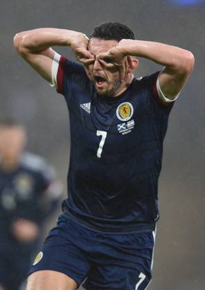 Glasgow, Scotland, 9th October 2021. John McGinn of Scotland scores ScotlandÕs 1st goal during the FIFA World Cup, WM, Weltmeisterschaft, Fussball qualifiers match at Hampden Park, Glasgow. Picture credit should read: Neil Hanna Sportimage EDITORIAL USE ONLY. No use with unauthorised audio, video, data, fixture lists, club league logos or live services. Online in-match use limited to 120 images, no video emulation. No use in betting, games or single club league player publications. SPI-1226-0047