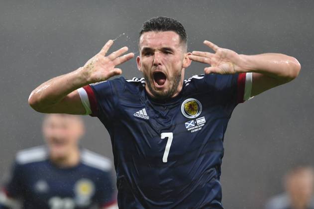 Glasgow, Scotland, 9th October 2021. John McGinn of Scotland scores ScotlandÕs 1st goal during the FIFA World Cup, WM, Weltmeisterschaft, Fussball qualifiers match at Hampden Park, Glasgow. Picture credit should read: Neil Hanna Sportimage EDITORIAL USE ONLY. No use with unauthorised audio, video, data, fixture lists, club league logos or live services. Online in-match use limited to 120 images, no video emulation. No use in betting, games or single club league player publications. SPI-1226-0049
