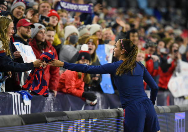 SAINT PAUL, MN - OCTOBER 26: United States forward Alex Morgan (13) gives her jersey to a fan after a friendly soccer match between Korea Republic and the United States on Oct 26, 2021 at Allianz Field in Saint Paul, MN. (Photo by Nick Wosika Icon Sportswire) SOCCER: OCT 26 Women s - USA v Korea Icon2021102622
