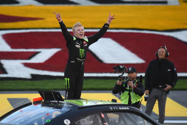 LAS VEGAS, NV - MARCH 05: Ty Gibbs ( 54 Joe Gibbs Racing Monster Energy Toyota) climbs onto his car and celebrates winning the race during the NASCAR, Motorsport, USA Xfinity Series Alsco Uniforms 300 on March 05, 2022, at Las Vegas Motor Speedway in Las Vegas, NV. (Photo by Chris Williams Icon Sportswire) AUTO: MAR 05 NASCAR Xfinity Series - Alsco Uniforms 300 Icon0072203051185