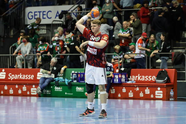 Justus Fischer TSV Hannover Burgdorf,54 Handball Bundesliga season 2021 2022 SC Magdeburg vs TSV Hannover Burgdorf in the GETEC Arena in Magdeburg action,man,men,handball,Germany,31 03 2022
