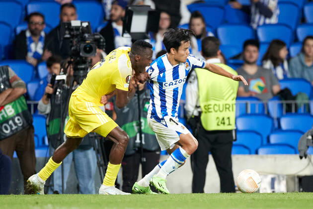 October 13, 2022, SAN SEBASTIAN, GUIPUZCOA, SPAIN: Takefusa Kubo of Real Sociedad competes for the ball with Patrick Kpozo of FC Sheriff Tiraspol during the UEFA Europa League group E match between Real Sociedad and FC Sheriff Tiraspol at Reale Arena on October 13, 2022, in San Sebastian, Spain. SAN SEBASTIAN SPAIN - ZUMAa181 20221013_zaa_a181_111 Copyright: xRicardoxLarreinax