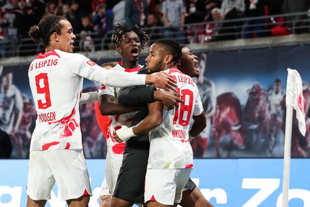 Goal celebration scorer Christopher Nkunku RB Leipzig,18 hits to the goal, the goal is not given, here with v l Yussuf Poulsen RB Leipzig,9 ,Amadou Haidara RB Leipzig,8 ,Mohamed Simakan RB Leipzig,2 1 Football Bundesliga season 2022 2023 point game RB Leipzig vs Hertha BSC Berlin in the Red Bull Arena in Leipzig action,football,Germany,man,men,15 10 2022