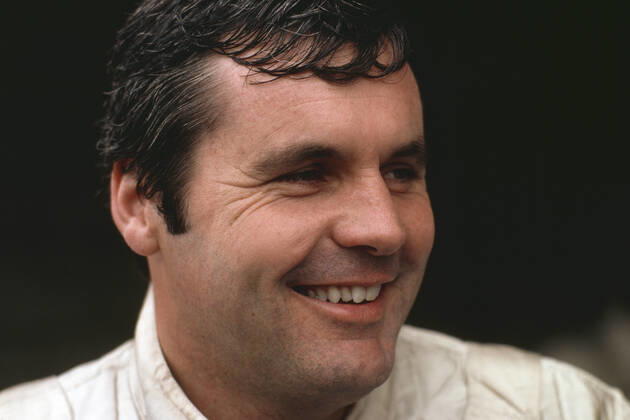 Alan Jones racing driver born 2 11 1946 in Melbourne AUS drove from 1975 to 1986 Formula 1 and was 1980 Automobile World Champion as the second Australian after Jack Brabham for the first time he won a Formula 1 race in 1977 the Grand Prix of Austria and became famous because the Austrians at the award ceremony had no Australian anthem ready or knew or could why a trumpeter helped out with happy birthday