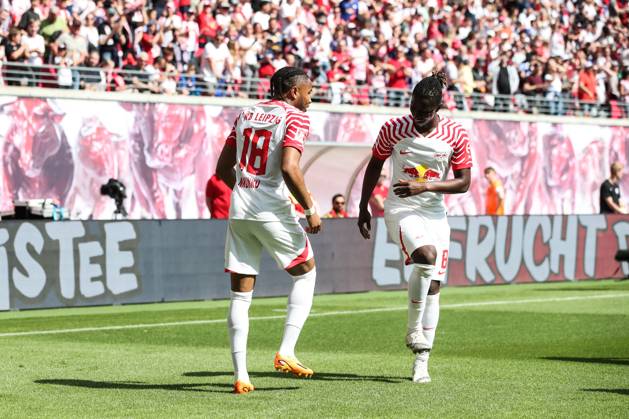 Goal celebration scorer Christopher Nkunku RB Leipzig,18 scores to 2 0 with Amadou Haidara RB Leipzig,8 1 Football Bundesliga season 2022 2023 point game RB Leipzig vs FC Schalke 04 in the Red Bull Arena in Leipzig action,football,Germany,man,men,27 05 2023