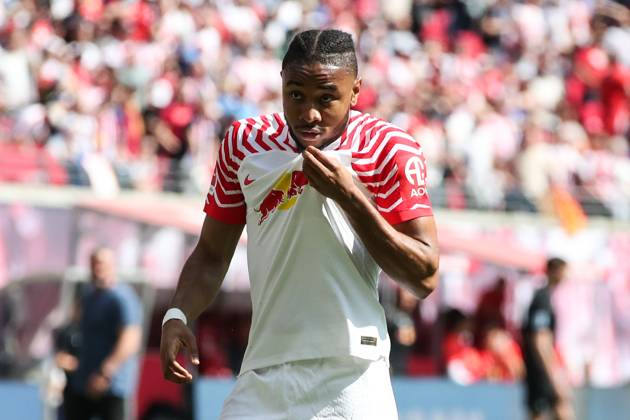 Goal celebration scorer Christopher Nkunku RB Leipzig,18 scores 2 0 1 Football Bundesliga season 2022 2023 point game RB Leipzig vs FC Schalke 04 at Red Bull Arena in Leipzig action,football,Germany,man,men,27 05 2023