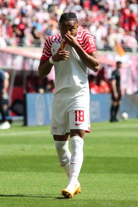 Goal celebration scorer Christopher Nkunku RB Leipzig,18 scores 2 0 1 Football Bundesliga season 2022 2023 point game RB Leipzig vs FC Schalke 04 at Red Bull Arena in Leipzig action,football,Germany,man,men,27 05 2023