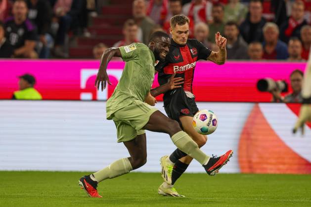 in duel, action, with Dayot Upamecano 2 FC Bayern Muenchen , Florian Wirtz 10 Bayer 04 Leverkusen , FC Bayern Muenchen vs Bayer 04 Leverkusen, football, 1 Bundesliga, 4 Spieltag, 15 09 2023 DFB regulations prohibit any use of photographs as image sequences and or quasi video Muenchen Bayern Germany Copyright: xkolbert-press ChristianxKolbertx