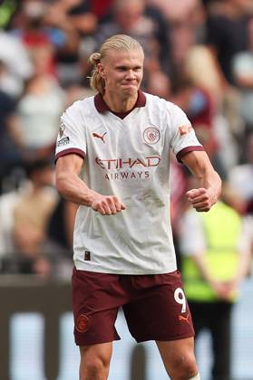 Erling Haland of Manchester City scores to make it 1-3 and celebrates during the Premier League match between West Ham United and Manchester City at the London Stadium, Queen Elizabeth Olympic Park , London, England on 16 September 2023. Copyright: xKenxSparksx 38290036