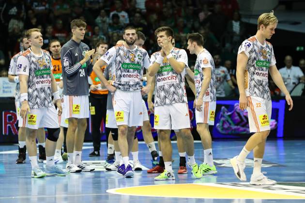 Renars Uscins TSV Hannover Burgdorf,10 Disappointed, the players of TSV Hannover Burgdorf after the end of the game Handball Bundesliga season 2023 2024 SC Magdeburg vs TSV Hannover Burgdorf at the GETEC Arena in Magdeburg Action,Handball,Germany,15 10 2023