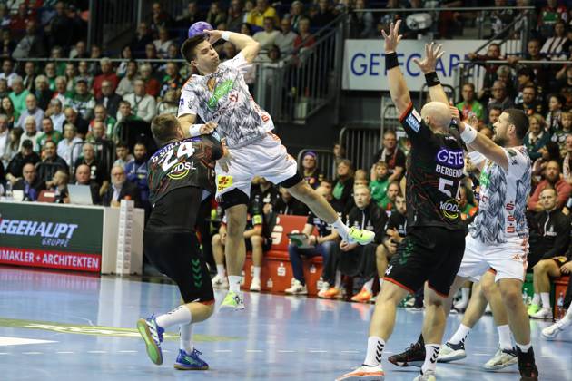 Renars Uscins TSV Hannover Burgdorf,10 Handball Bundesliga Season 2023 2024 SC Magdeburg vs TSV Hannover Burgdorf at GETEC Arena in Magdeburg Action,Handball,Germany,15 10 2023