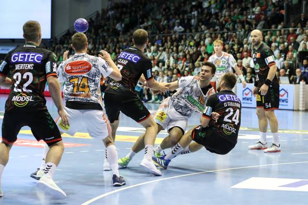Renars Uscins TSV Hannover Burgdorf,10 Handball Bundesliga Season 2023 2024 SC Magdeburg vs TSV Hannover Burgdorf at GETEC Arena in Magdeburg Action,Handball,Germany,15 10 2023