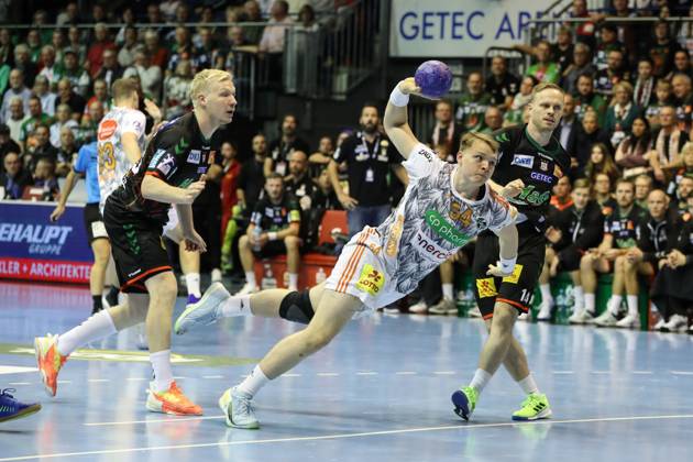 Justus Fischer TSV Hannover Burgdorf,54 Handball Bundesliga Season 2023 2024 SC Magdeburg vs TSV Hannover Burgdorf in the GETEC Arena in Magdeburg Action,Handball,Germany,15 10 2023