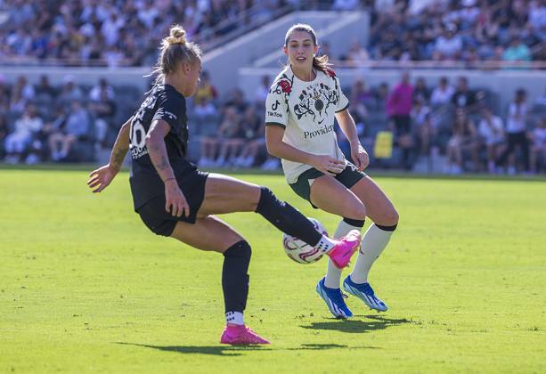 October 15, 2023, Los Angeles, California, USA: Morgan Weaver 22 of the Portland Thorns FC and M. A. Vignola 16 of Angel City FC struggle for possession of the ball during their NWSL game against the Portland Thorns FC on Sunday October 15, 2023 at the BMO Stadium in Los Angeles, California. ARIANA RUIZ PI Los Angeles USA - ZUMAp124 20231015_zaa_p124_005 Copyright: xArianaxRuizx