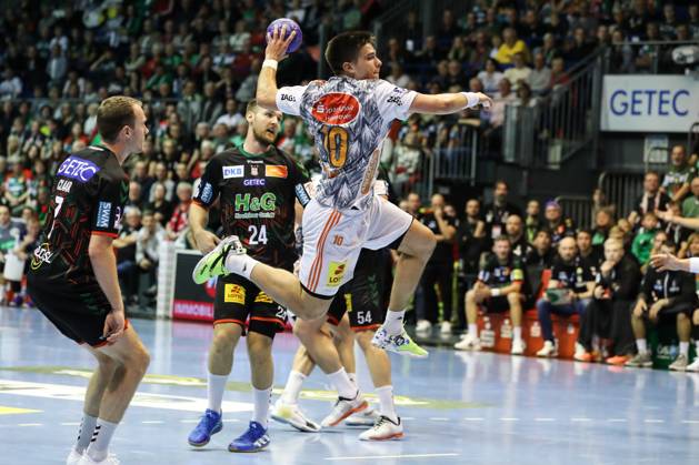 Renars Uscins TSV Hannover Burgdorf,10 Handball Bundesliga Season 2023 2024 SC Magdeburg vs TSV Hannover Burgdorf at GETEC Arena in Magdeburg Action,Handball,Germany,15 10 2023