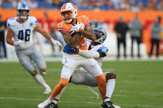 TAMPA, FL - OCTOBER 15: Tampa Bay Buccaneers Wide Receiver Mike Evans (13) fights for yardage after making the catch during the regular season game between the Detroit Lions and the Tampa Bay Buccaneers on October 15, 2023 at Raymond James Stadium in Tampa, Florida. (Photo by Cliff Welch Icon Sportswire) NFL, American Football Herren, USA OCT 15 Lions at Buccaneers EDITORIAL USE ONLY Icon357231015105