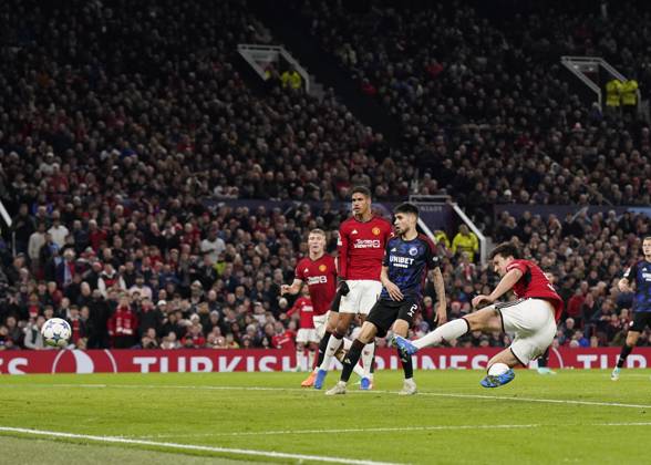 Manchester, England, 24th October 2023. Harry Maguire of Manchester United, ManU scores the first goal during the UEFA Champions League match at Old Trafford, Manchester. Picture credit should read: Andrew Yates Sportimage EDITORIAL USE ONLY. No use with unauthorised audio, video, data, fixture lists, club league logos or live services. Online in-match use limited to 120 images, no video emulation. No use in betting, games or single club league player publications. SPI-2672-0080