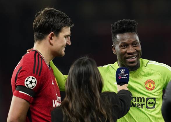 Manchester, England, 24th October 2023. Harry Maguire of Manchester United, ManU and Andrà Onana of Manchester United are interviewed at the end of the game during the UEFA Champions League match at Old Trafford, Manchester. Picture credit should read: Andrew Yates Sportimage EDITORIAL USE ONLY. No use with unauthorised audio, video, data, fixture lists, club league logos or live services. Online in-match use limited to 120 images, no video emulation. No use in betting, games or single club league player publications. SPI-2672-0093