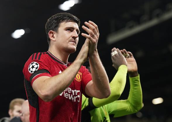 Manchester, England, 24th October 2023. Harry Maguire of Manchester United, ManU and Andrà Onana of Manchester United take the acclaim during the UEFA Champions League match at Old Trafford, Manchester. Picture credit should read: Andrew Yates Sportimage EDITORIAL USE ONLY. No use with unauthorised audio, video, data, fixture lists, club league logos or live services. Online in-match use limited to 120 images, no video emulation. No use in betting, games or single club league player publications. SPI-2672-0095